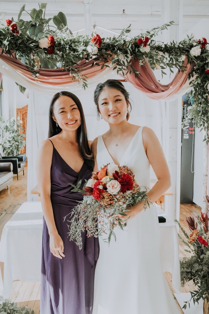 christine and shiwon posing for shiwon's wedding