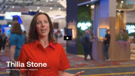 A woman in a red shirt speaks at a conference, with booths and attendees visible in the background. Text on screen reads: “Thilia Stone, Senior Manager, Business Intelligence, Shipt.”.